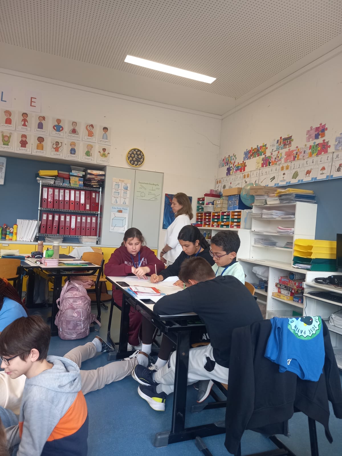 Students proudly displaying their certificates of completion